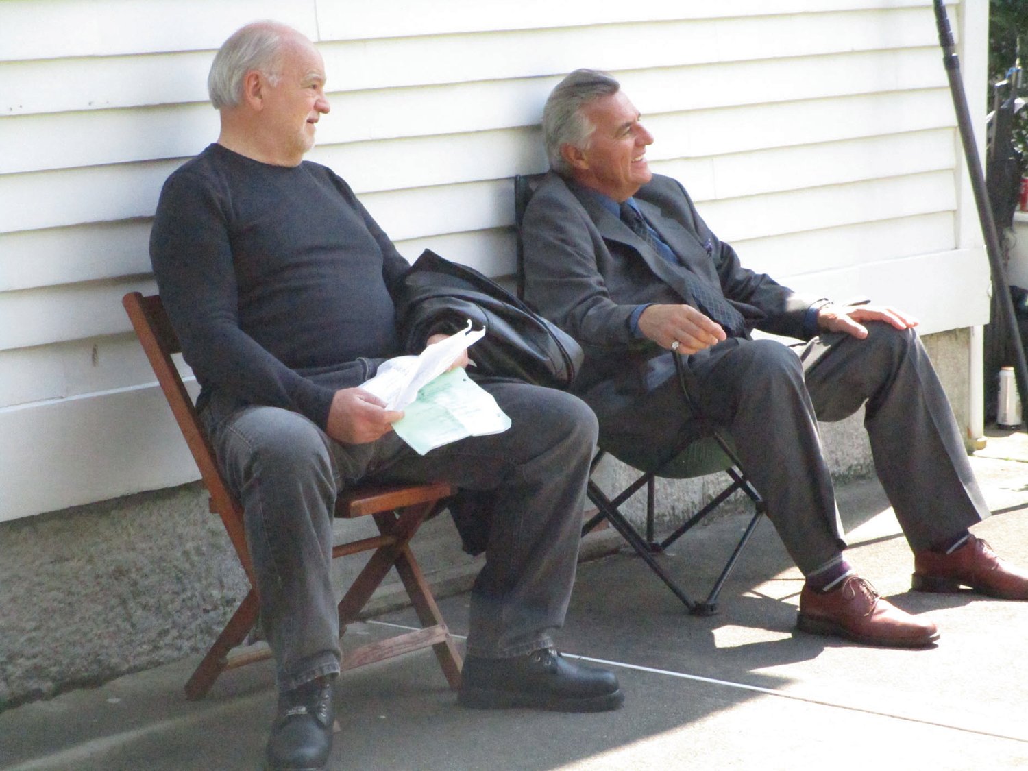 FILM VETERANS: Richard Riehle, left, and Stephen O’Neil Martin share a lighter moment while preparing for the start of filming on Saturday.